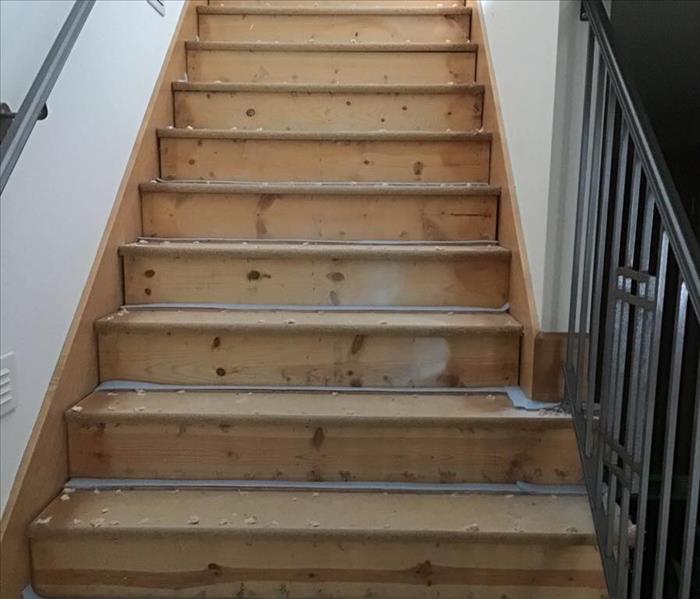 carpet removed from wet stairs 